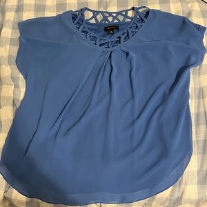 Woman’s blue dress shirt
